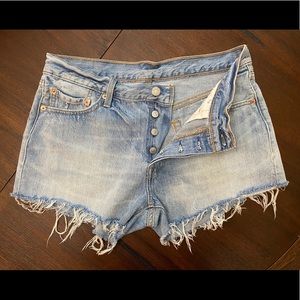 Levi 501 light wash distressed shorts